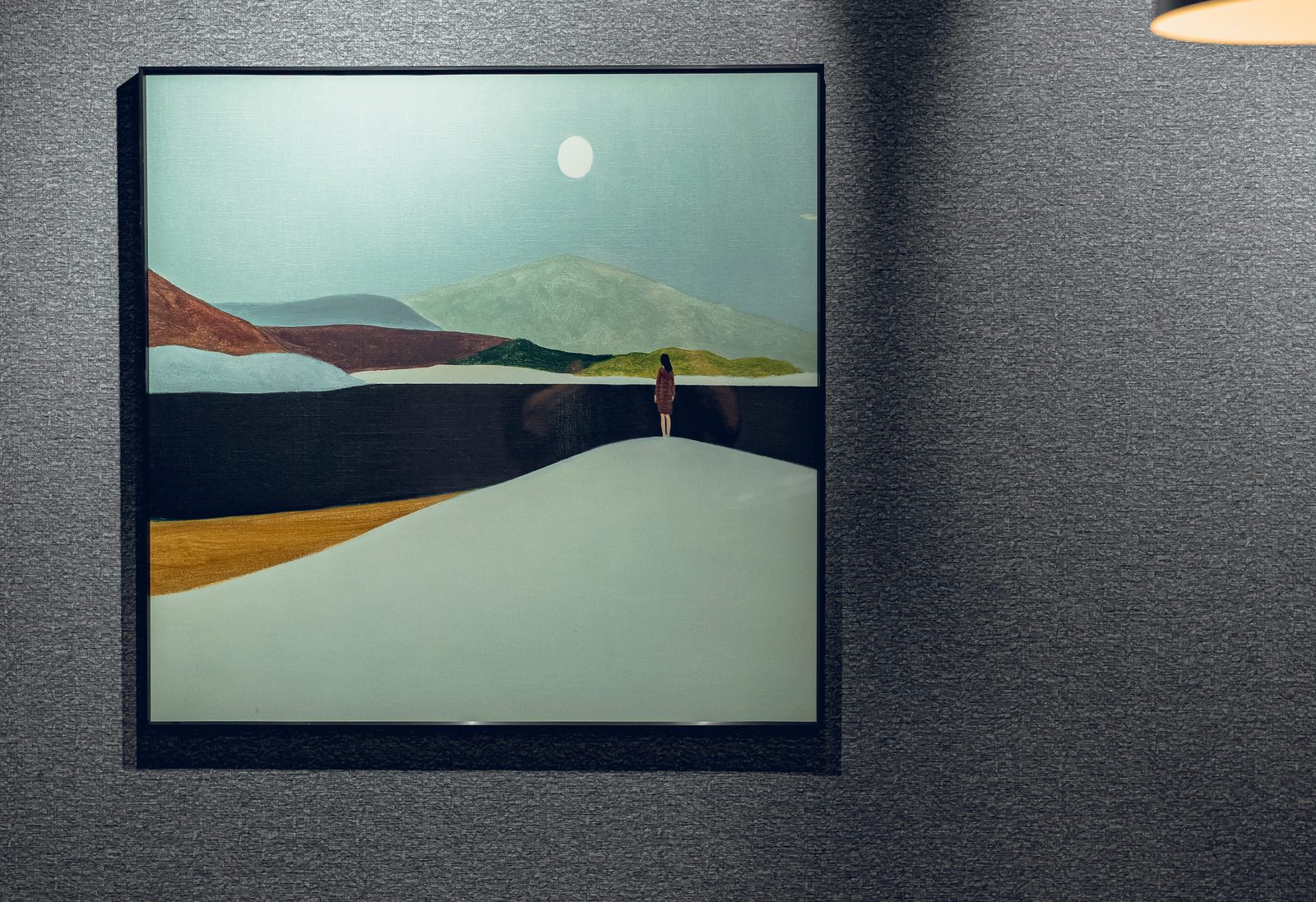A landscape painting on the wall of an ACOE property